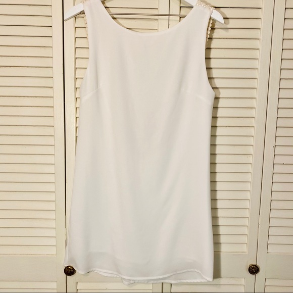 The hanger cream/ white dress. - Picture 2 of 4